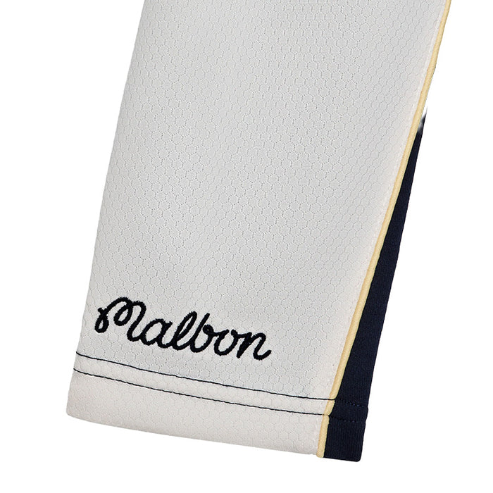 View of the Malbon Aurora Midlayer sleeve,  showing an embroidered Malbon logo at the bottom of the sleeve.