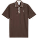 A dark brownish golf polo shirt from Puma and arnold palmer in flat bronze viewed from the front
