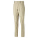 A view from the front of a pair of beige alabaster Puma Golf trousers