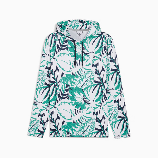 A puma x palm tree crew long-sleeve hooded golf sweatshirt with an all-over tropical leaf print in green, teal, navy, and white, shown flat against a light gray background.