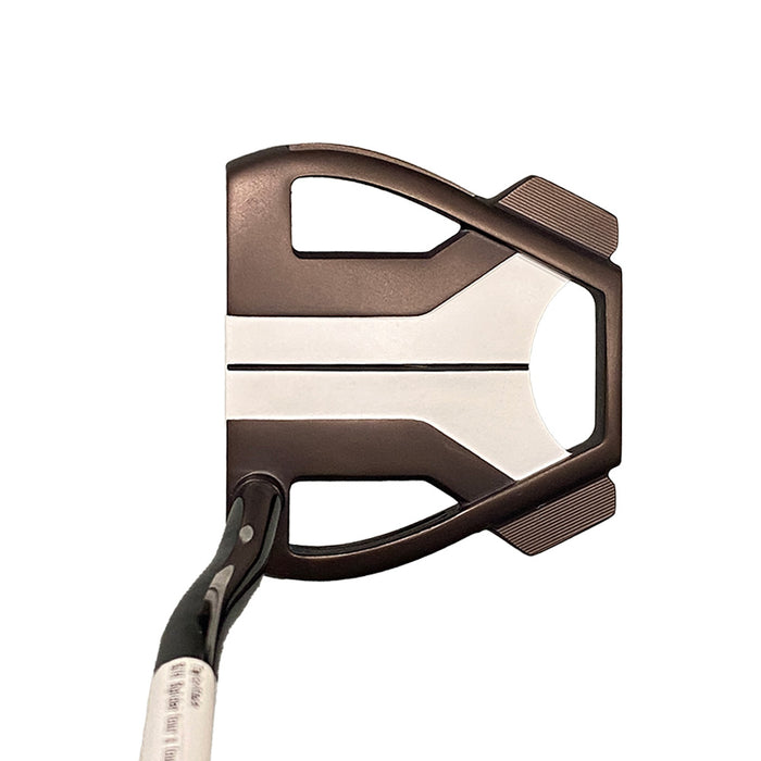 A close-up studio shot of a golf putter head and part of its shaft against a solid white background.